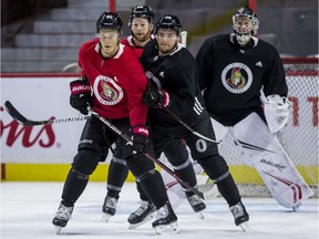 Ottawa Senators Vladislav Namestnikov, Connor Brown, Erik Brannstrom and goaltender Craig Anderson during team practice on Tuesday.