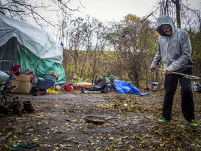 After two rooming home fires in the area there are a group of people who can not find an affordable place to call home, so have built a tent commune in a wooded area behind the Bayview Station.