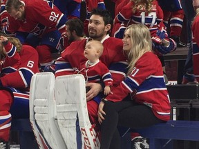 Canadiens goalie Carey Price poses with his wife, Angela, and their daughter, Liv Anniston, during Canadiens photo day at the Bell Centre in Montreal on March 27, 2017.