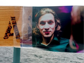 An image of Damian Sobieraj is seen Thursday on a memorial placed near the spot where he died at Hardy Park.