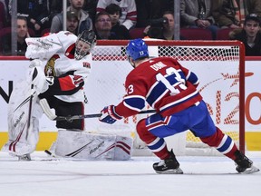 Goaltender Craig Anderson of the Ottawa Senators plays the puck past Max Domi of the Montreal Canadiens at the Bell Centre on Nov. 20, 2019. Anderson, who was sharp in a 2-1 overtime win, and Anders Nilsson are both rounding into form.