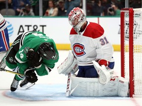 Canadiens' Carey Price defends against Stars' Jamie Benn in the third period at American Airlines Center on Saturday, Nov. 2, 2019, in Dallas.