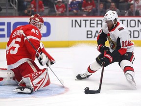 DETROIT, MICHIGAN - NOVEMBER 19: Anthony Duclair #10 of the Ottawa Senators scores a first period goal past Jonathan Bernier #45 of the Detroit Red Wings at Little Caesars Arena on November 19, 2019 in Detroit, Michigan.