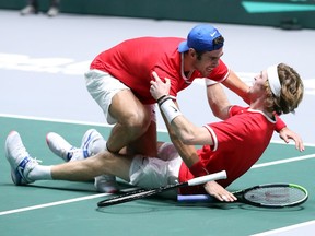 Andrey Rublev of Russia and teammate Karen Khachanov celebrate winning match point in their quarter-final doubles match against Serbia on Day Five of the 2019 Davis Cup at La Caja Magica on Friday, Nov. 22, 2019 in Madrid.