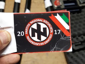 Italian police handout shows a sticker with the symbol of the 'Italian National Socialist Workers' Party' that they say was seized in searches of properties of an extreme right group who planned to create a new Nazi party, in an unidentified location in Italy in a picture released on November 28, 2019. (Polizia di Stato/Handout via REUTERS)