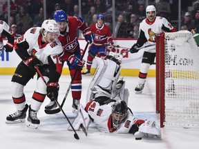 Senators goaltender Craig Anderson dives for the puck during Wednesday's game against Montreal. (GETTY IMAGES)