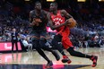 Toronto Raptors forward Chris Boucher drives to the basket against Orlando Magic center Mo Bamba on Friday night. (USA TODAY SPORTS)
