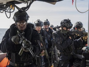 Boarding party members from HMCS FREDERICTON conduct a simulated boarding during Exercise CUTLASS FURY 19, taking place off the coast of Nova Scotia and Newfoundland, September 10, 2019. Photo by: IS14-2019-0001-129