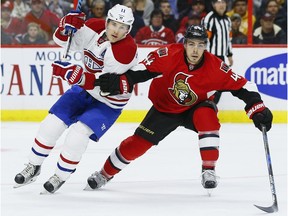 Canadiens winger Brendan Gallagher and Senators centre Jean-Gabriel Pageau battle for position during a game in Ottawa during the 2016-17 season.
