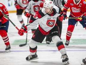 Ottawa 67’s Austen Keating fights for the puck against the Oshawa Generals at TD Place last night. Oshawa won 3-2. (Valerie Wutti/OSEG)