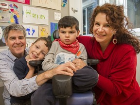 Andrea Gumpert and her husband David Bell with their two sons, Florian, 6, left, and Emanuel, 8.