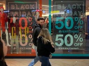 Shoppers look for early bargains as the Black Friday sales begin on U.S. Thanksgiving Day in Los Angeles, Calif., on Nov. 28, 2019. (MARK RALSTON/AFP via Getty Images)