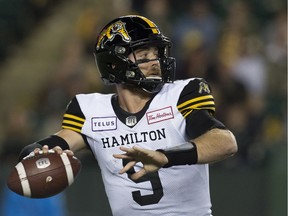 The Hamilton Tiger-Cats' quarterback Dane Evans battles the Edmonton Eskimos during first half CFL action at Commonwealth Stadium, in Edmonton Sept. 20, 2019. (David Bloom/Postmedia Network files)