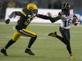 The Edmonton Eskimos' Anthony Orange (24) chases the Hamilton Tiger-Cats' Brandon Banks in a September 2019 game. Banks had a league-leading 1,550 yards in catches in just 16 games, with 13 touchdowns.
