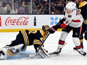 Boston Bruins goaltender Tuukka Rask makes a save on a shot by Ottawa Senators left wing Brady Tkachuk on Nov. 2, 2019.