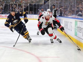 Ottawa Senators right wing Connor Brown carries the puck as Buffalo Sabres defenseman Brandon Montour defends during the third period at KeyBank Center.