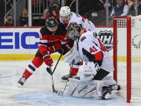 Ottawa Senators goaltender Craig Anderson (41) makes a save against New Jersey Devils centre Kyle Palmieri (21) during the second period at Prudential Center.