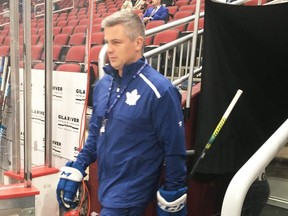 New Leafs coach Sheldon Keefe heads for the Gila River Arena ice in Glendale, Ariz., on Thursday. TERRY KOSHAN/TORONTO SUN