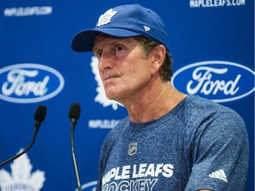 Mike Babcock addresses the media in September 2019.