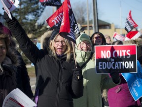 Teachers and support staff were set up outside the Billings Bridge Shopping Centre on Saturday, Nov. 30, 2019, to supply the public with information as well as voice their concerns with the potential labour dispute.