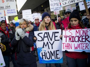 Residents from Toronto to West Carleton gathered at the International Joint Commission office and then made their way to Parliament Hill, protesting the perceived inaction on the extreme flooding and current high water levels in the Great Lakes, on Saturday, Nov. 23, 2019.