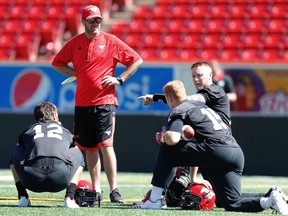 Sources say Calgary Stampeders quarterbacks coach Ryan Dinwiddie is among those who have or will talk to the Redblacks about their vacant head coach position.