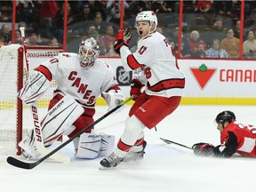 Warren Foegele tries to argue a slashing penalty in first period action as the Ottawa Senators take on the Carolina Hurricanes in NHL action at the Canadian Tire Centre in Ottawa on Saturday.