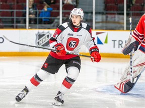 Forward Jack Quinn of the Ottawa 67's watches the play during an Ontario Hockey League game against the Oshawa Generals at TD Place arena on Saturday, Nov. 30, 2019. Ottawa won the game 4-3.