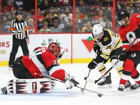 Senators goalie Anders Nilsson makes a save against the Boston Bruins on Monday night at the Canadian Tire Centre.