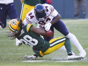 Chicago Bears' Cordarrelle Patterson hits Green Bay Packers' Tramon Williams on a punt return during Sunday's game.