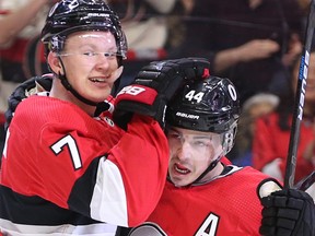 Senators' Jean-Gabriel Pageau (right) is congratulated by Brady Tkachuk after scoring in the first period on Monday night against the Buffalo Sabres. (WAYNE CUDDINGTON/Postmedia Network)