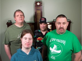 (Clockwise from lower left) Suzanne Winter-Heartson, 32, Brian Jones, 48, Scott Helman, 50, and Paul Pringle, 45, are four of 33 workers with developmental disabilities that have been told their contract shredding paper for the federal government will end next year.