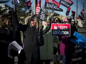 Teachers and support staff were set up outside Billings Bridge Shopping Centre on Saturday to supply the public with information as well as voice their concerns with the potential labour dispute.