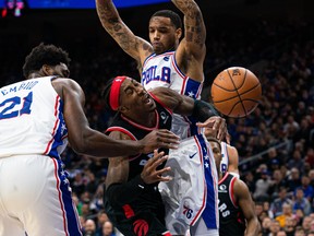 Raptors forward Rondae Hollis-Jefferson looses control of the ball while driving against Philadelphia 76ers centre Joel Embiid (left) and guard Josh Richardson during the first quarter at Wells Fargo Center.