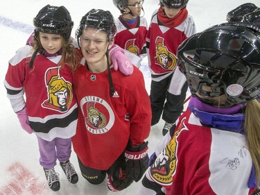 Brady Tkachuk with a group of kids during the 16th annual Eugene Melnyk Skate for Kids at Canadian Tire Centre on Friday, Dec. 20.