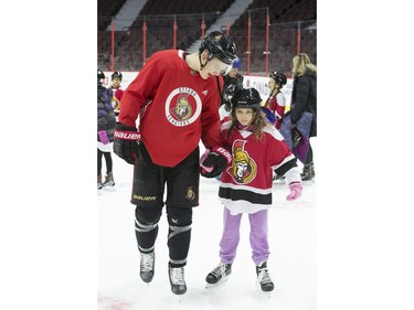 Brady Tkachuk skates with Mykala during the 16th annual Eugene Melnyk Skate for Kids at Canadian Tire Centre on Friday, Dec. 20.