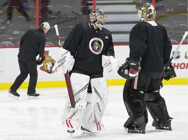 Ottawa Senators goalies Craig Anderson (L) and Marcus Hogberg (R) prior to taking part in the 16th annual Eugene Melnyk Skate for Kids at Canadian Tire Centre on Friday, Dec. 20.