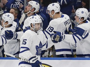 Maple Leafs forward Alex Kerfoot (15) celebrates a first period goal against the Oilers at Rogers Place in Edmonton, Saturday, Dec. 14, 2019.