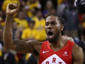 OAKLAND, CALIFORNIA - JUNE 13: Kawhi Leonard #2 of the Toronto Raptors celebrates his teams win over the Golden State Warriors in Game Six to win the 2019 NBA Finals at ORACLE Arena on June 13, 2019 in Oakland, California. NOTE TO USER: User expressly acknowledges and agrees that, by downloading and or using this photograph, User is consenting to the terms and conditions of the Getty Images License Agreement. (Photo by Ezra Shaw/Getty Images)