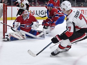 Montreal Canadiens goalie Cayden Primeau makes a save against Ottawa Senators forward Brady Tkachuk during the second period at the Bell Centre.