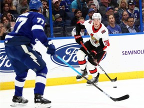 Dec 17, 2019; Tampa, FL, USA; Ottawa Senators defenseman Thomas Chabot (72) skates with the puck as Tampa Bay Lightning defenseman Victor Hedman (77) defends during the second period at Amalie Arena.