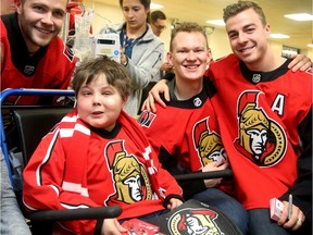 Jacob Choueiri, 9, who suffers from leukemia, was thrilled to meet some of his hockey heroes during the visit, including (from left): Cody Goloubef, Brady Tkachuk and his favourite, J-G Pageau.