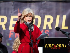 In this Dec. 6, file photo, actress Jane Fonda speaks during a rally to protest against climate change in Washington, D.C. (JIM WATSON/AFP via Getty Images)