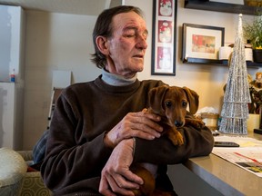 Richard Larocque and his dachshund puppy, Max, survived a cottage fire recently.