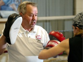 Joe Sandulo works in the ring with Jill Perry in 2005.