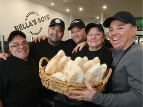 Bella's Boys Italian Kitchen in Ottawa Monday Dec 2, 2019. Eugenio, Andrew, Rob Bella and Nick Milito pose for a photo at Bella's Monday.