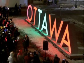 People gathered and celebrated the debut of the new OTTAWA letters on Friday, Dec. 20, 2019. Tony Caldwell