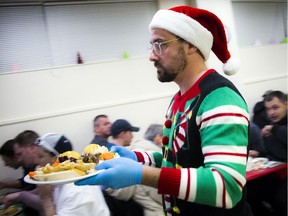 Sam Robinson volunteered at the Salvation Army Community Christmas Dinner on Saturday, Dec. 14, 2019.