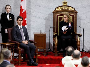 Gov. Gen. Julie Payette looks at Prime Minister Justin Trudeau during the delivery of the Throne Speech in the Senate, as parliament prepares to resume for the first time after the election in Ottawa, Dec. 5, 2019.
