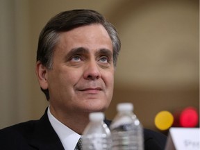 Jonathan Turley, professor of law at George Washington University Law School, listens to questions while testifying during a House Judiciary Committee hearing on the impeachment inquiry into U.S. President Donald Trump on Capitol Hill in Washington, Dec. 4, 2019.